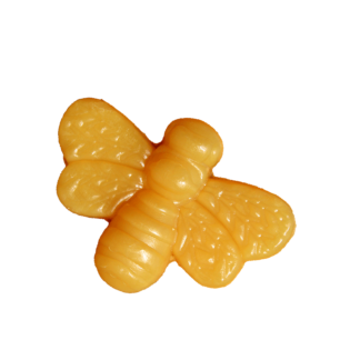 Ein Stück Seife in der Form einer Biene und der Farbe von Bienenwachs